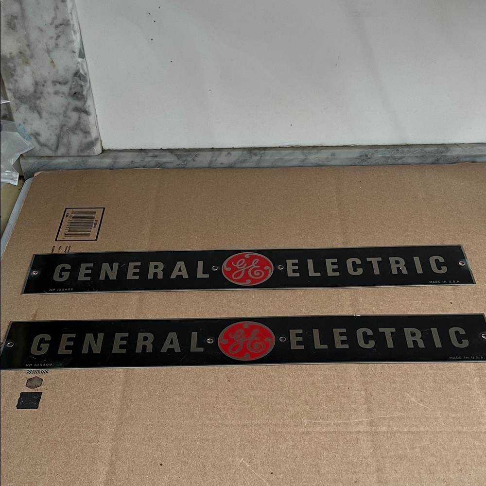 General Electric  Black Metal 'ELECTRIC' Sign with Red Emblem General Electric